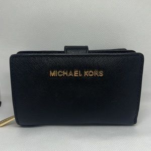 Really Nice MK Wallet. Black W/Gold hardware. 🙂🌼🌸🌷✨💫⭐️